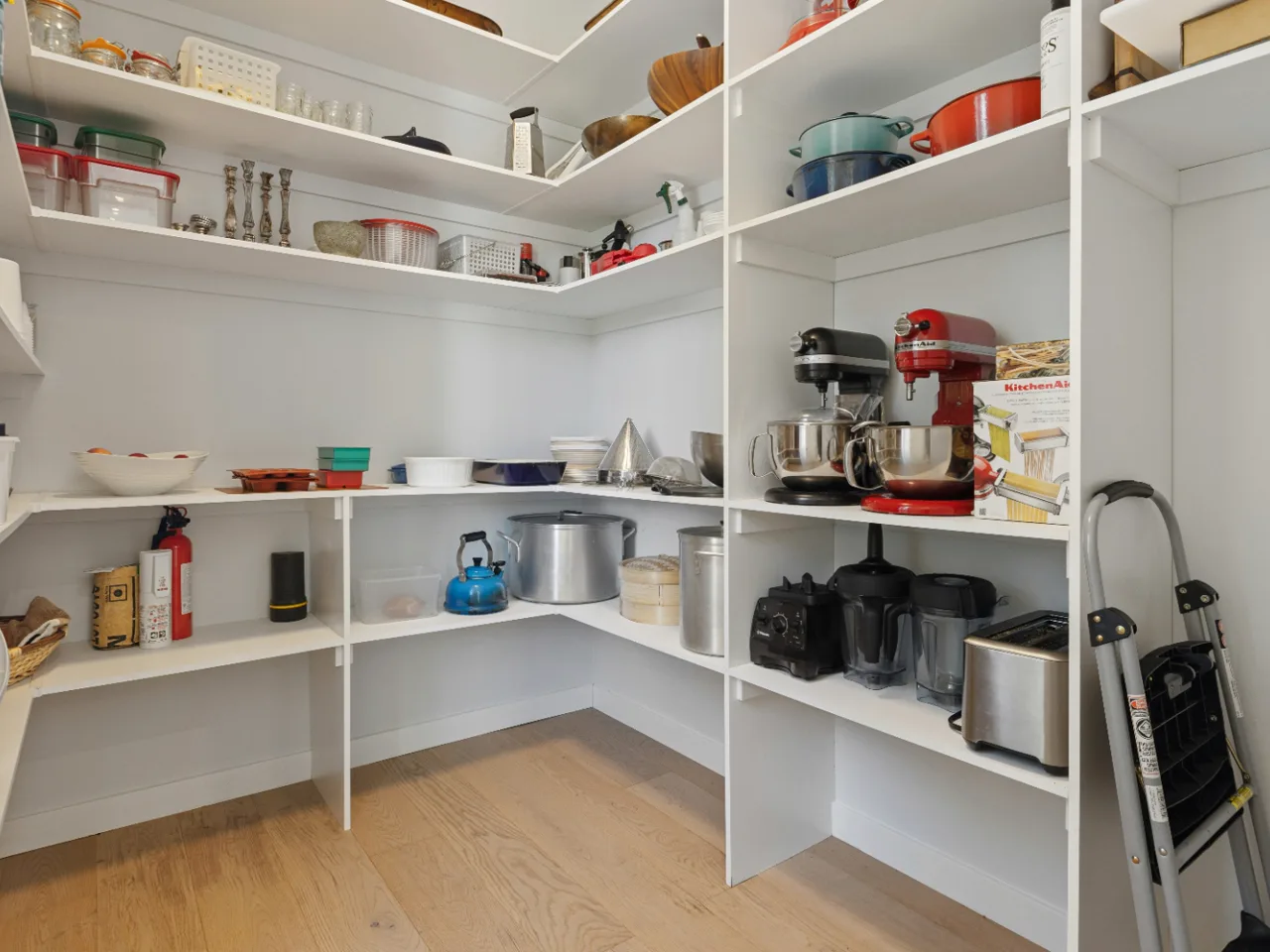 Beautifully organized and staged walk-in pantry by Eudemonia in Richardson, TX
